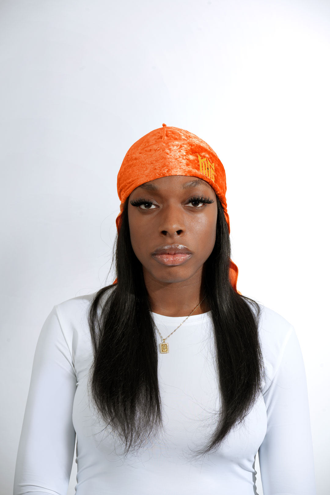 Adjustable orange velvet durag protecting hair