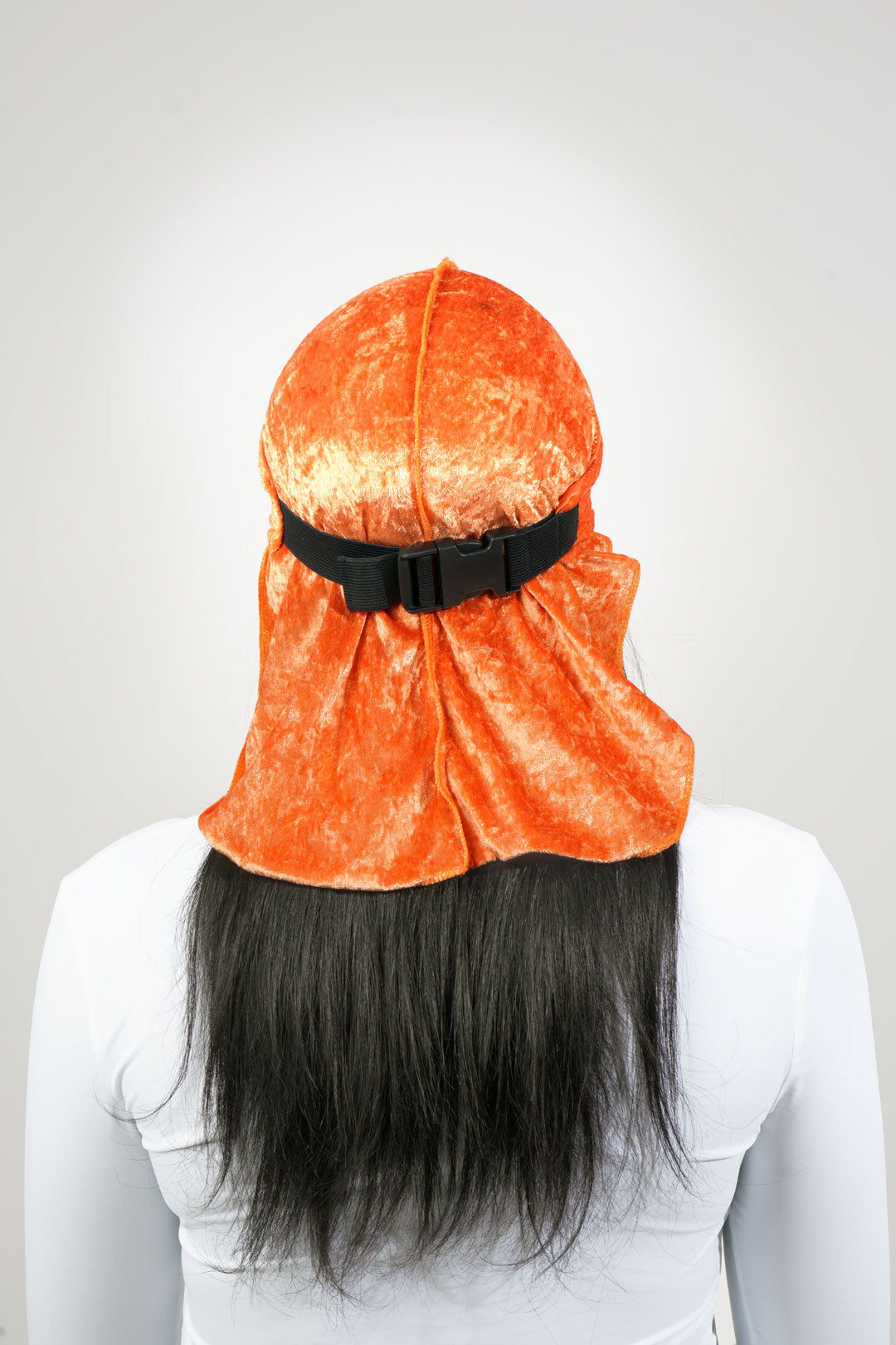 Adjustable orange velvet durag protecting hair